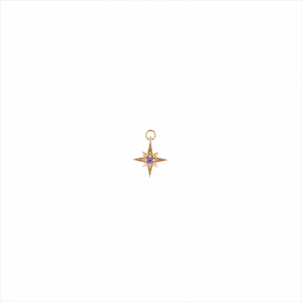 Colgante charm plata bañada en oro, estrella polar circonita morada brillante. Miscellany. Salvatore