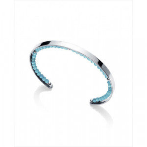 Brazalete Viceroy Kiss de acero y turquesas sintéticas en el interior. Apertura de 3cm y diámetro de 58 mm.