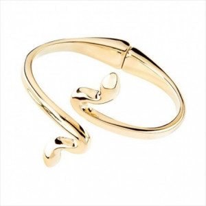 Pulsera Mrs Bhikaiji. Forma de serpiente, metal bañado en oro. Uno de 50