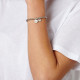 Pulsera Amor Sellado. Metal bañado en plata. Uno de 50