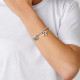 Pulsera Amor elástico. Metal bañado en plata. Uno de 50