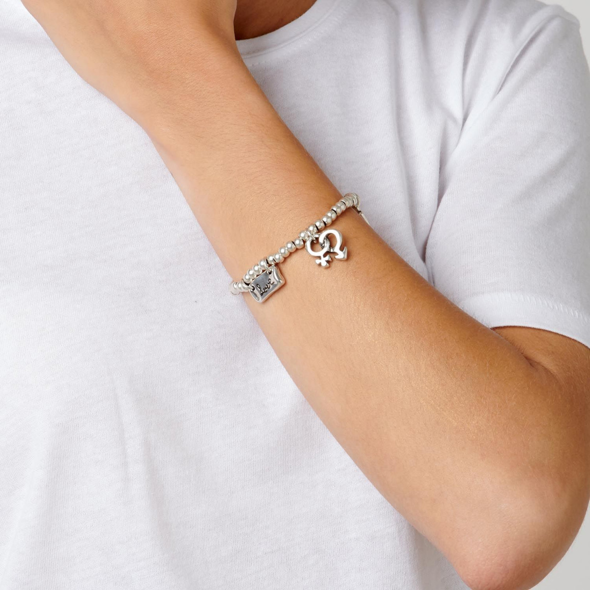 Pulsera Amor elástico. Metal bañado en plata. Uno de 50