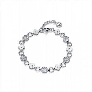Pulsera en acero con componentes en forma de trébol y discos engastados con circonitas. Largo 17cm y 2cm de extensión. Viceroy