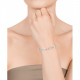 Pulsera en acero con componentes en forma de trébol y discos engastados con circonitas. Largo 17cm y 2cm de extensión. Viceroy