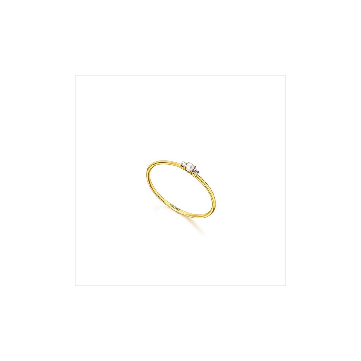 Anillo oro amarillo mini perla y diamantes laterales. LeCarré